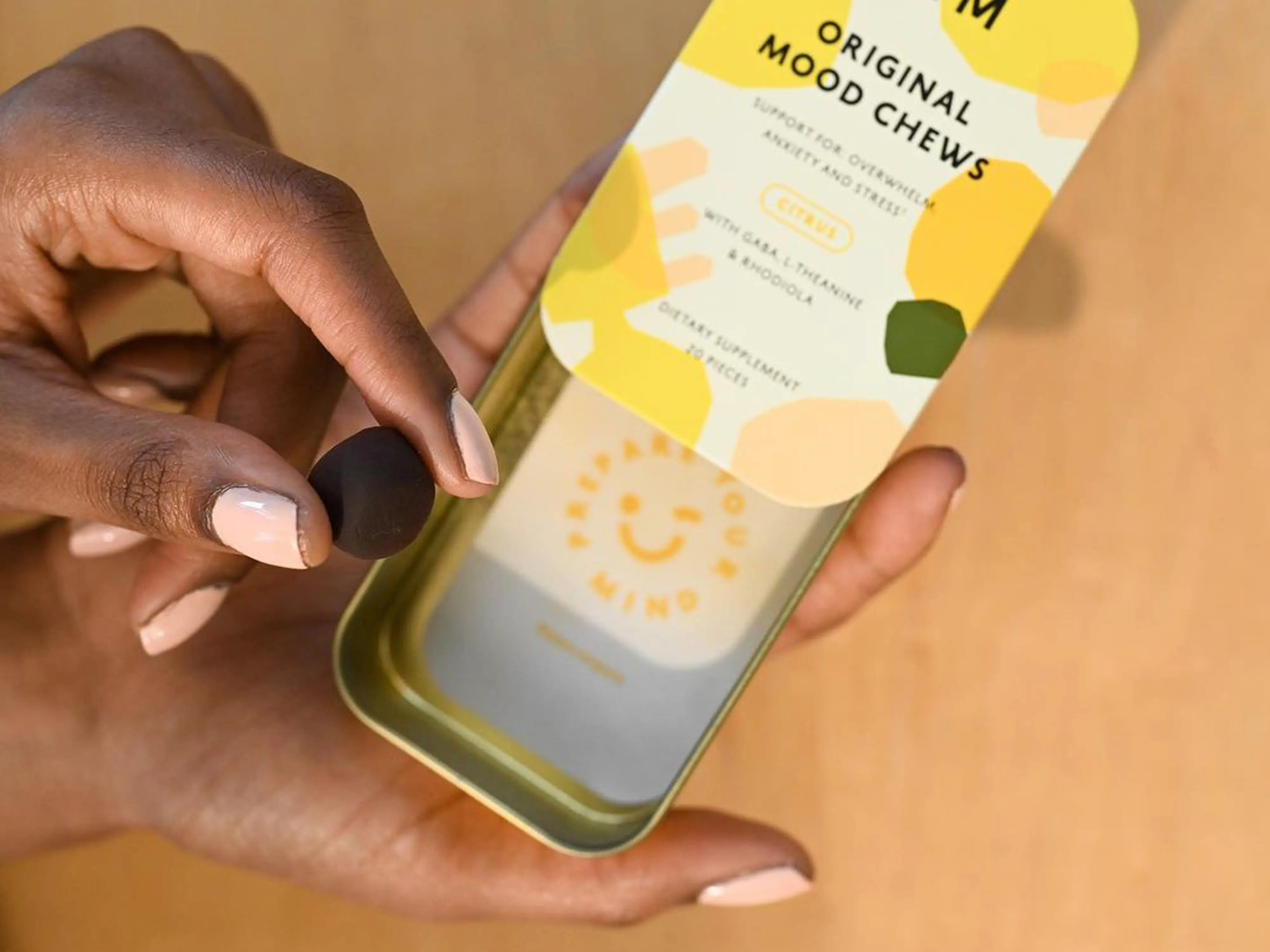 PYM sitting on a night table